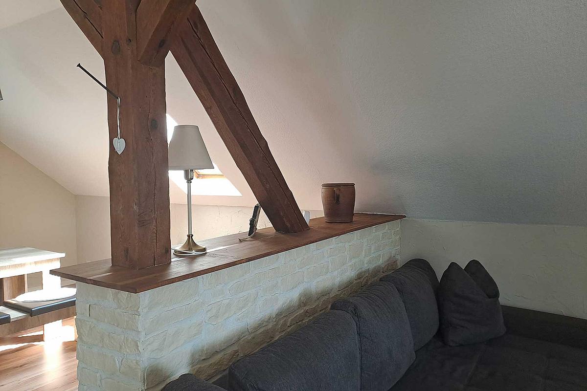 Ferienwohnung Spreezauber – fewo-spreezauber-luebben-wohnbereich-deckenbalken
